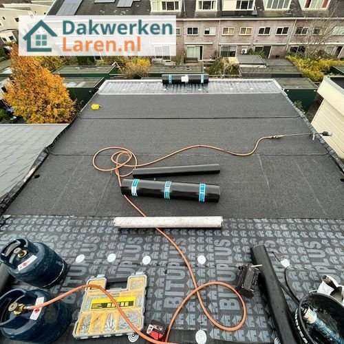 Plat dak opnieuw leggen Plat dak Laren opnieuw leggen